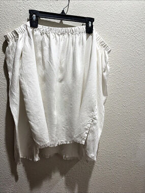 White Asymmetrical Frayed sleeves and hem top.